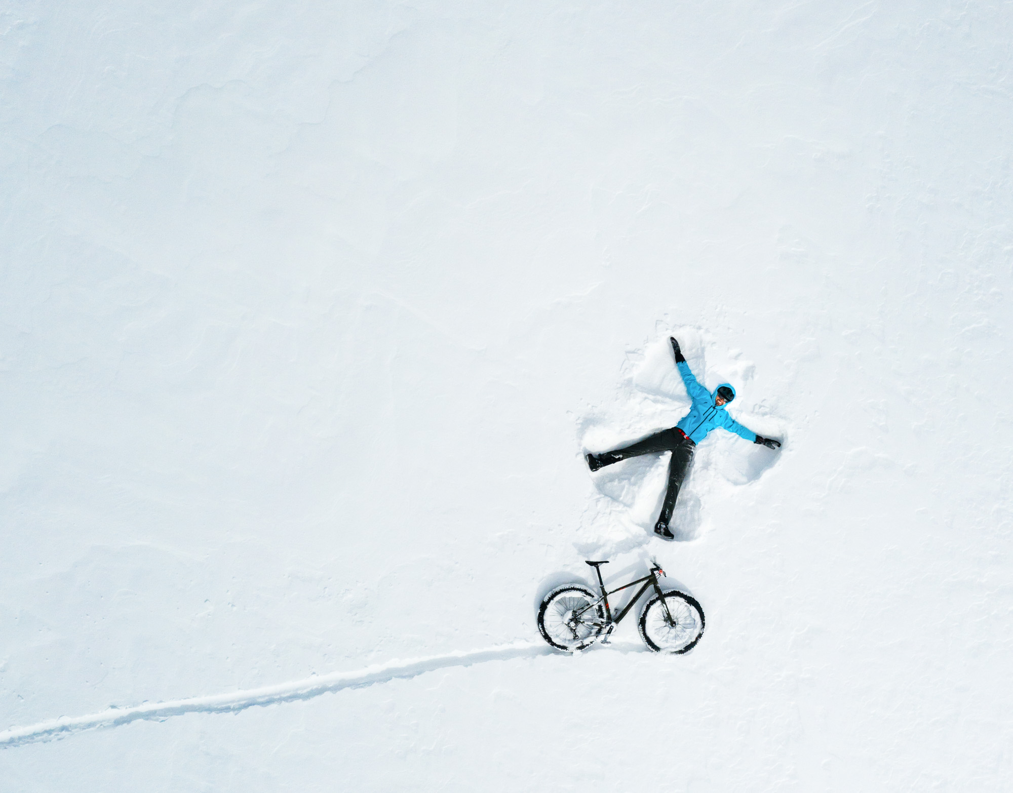 winter-bike-fun-outdoor-snow-angel